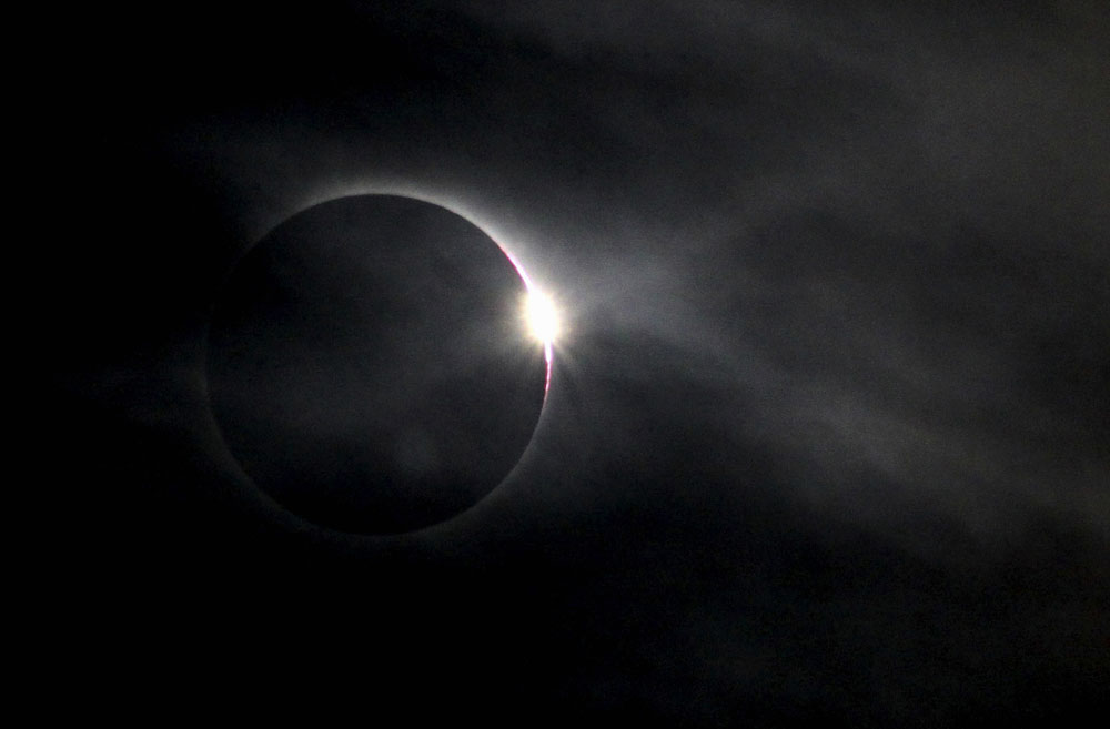 最新日食照片,学习、变化,探索星辰大海的无限可能